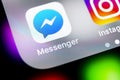 Facebook messenger application icon on Apple iPhone X screen close-up. Facebook messenger app icon. Online internet social media n Royalty Free Stock Photo