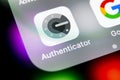 Google authenticator application icon on Apple iPhone X smartphone screen close-up. Google Authenticator app icon. Social network
