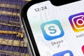 Skype application icon on Apple iPhone X smartphone screen close-up. Skype messenger app icon. Social media icon. Social network.