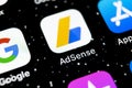 Google AdSense application icon on Apple iPhone X screen close-up. Google AdSense app icon. Google AdSense application. Social med Royalty Free Stock Photo
