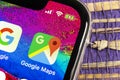 Google Maps application icon on Apple iPhone X screen close-up. Google Maps icon. Google maps application. Social media network Royalty Free Stock Photo