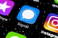 Signal messenger application icon on Apple iPhone X smartphone screen close-up. Signal messenger app icon. Social media network