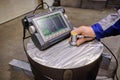 Ultrasonic flaw detector krautkramer USM 36 at the plant during accurate measurement of steel thickness