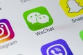 Wechat messenger application icon on Apple iPhone X smartphone screen close-up. Wechat messenger app icon. Social media network.