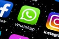 Whatsapp messenger application icon on Apple iPhone X smartphone screen close-up. Whatsapp messenger app icon. Social media icon. Royalty Free Stock Photo