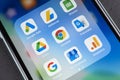 Google applications icon on Apple iPhone 11 smartphone screen close-up. Apps Chrome, drive, ads, translate, my business, analytics