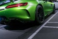 Green Mercedes-Benz AMG GTR 2018 V8 Bi-turbo exterior details. Back view. Car exterior details
