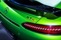 Green Mercedes-Benz AMG GTR 2018 V8 Biturbo exterior details, Headlight. Back view. Car exterior details