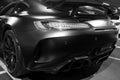 Mercedes-Benz AMG GTR 2018 V8 Bi-turbo exterior details. Back view. Car exterior details. Black and white