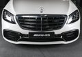 White Mercedes-Benz W222 S63 AMG 4matic V8 Bi-turbo exterior details. Headlight. Front view. Car exterior details Royalty Free Stock Photo