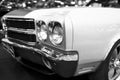 Front view of a great retro american muscle car Chevrolet Camaro SS. Car exterior details. Black and white. Royalty Free Stock Photo