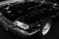 Front view of a Luxury car grand tourer Jaguar XJ-S Coupe. Black and white.