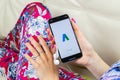 Google AdWords application icon on Apple iPhone X screen in woman hands. Google Ad Words Express icon. Google Adwords application.