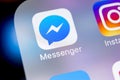 Facebook messenger application icon on Apple iPhone X screen close-up. Facebook messenger app icon. Online internet social media Royalty Free Stock Photo