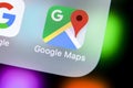 Google Maps application icon on Apple iPhone X screen close-up. Google Maps icon. Google maps application. Social media network Royalty Free Stock Photo