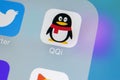 QQ international messenger application icon on Apple iPhone X smartphone screen close-up. QQ messenger app icon. Social media