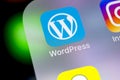 Wordpress application icon on Apple iPhone X screen close-up. Wordpress app icon. Wordpress.com application. Social network