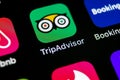 Tripadvisor application icon on Apple iPhone X screen close-up. Tripadvisor.com app icon. Social media network. Social media app