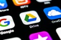 Google Drive application icon on Apple iPhone X screen close-up. Google drive icon. Google Drive application. Social media network Royalty Free Stock Photo