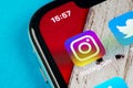 Instagram application icon on Apple iPhone X smartphone screen close-up. Instagram app icon. Social media icon. Social network Royalty Free Stock Photo
