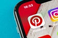 Pinterest application icon on Apple iPhone X smartphone screen. Pinterest app icon. Pinterest is the popular Internet social netw Royalty Free Stock Photo