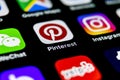 Pinterest application icon on Apple iPhone X smartphone screen. Pinterest app icon. Pinterest is the popular Internet social netw Royalty Free Stock Photo