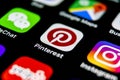 Pinterest application icon on Apple iPhone X smartphone screen. Pinterest app icon. Pinterest is the popular Internet social netw Royalty Free Stock Photo