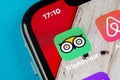 Tripadvisor application icon on Apple iPhone X screen close-up. Tripadvisor.com app icon. Social media network. Social media app