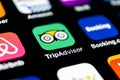 Tripadvisor application icon on Apple iPhone X screen close-up. Tripadvisor.com app icon. Social media network. Social media app