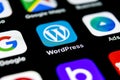 Wordpress application icon on Apple iPhone X screen close-up. Wordpress app icon. Wordpress.com application. Social network