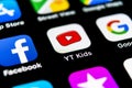 YouTube kids application icon on Apple iPhone X smartphone screen close-up. Youtube kids app icon. Social media icon. Social netwo