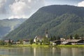 Sankt Ulrich am Pillersee with Jakobskreuz on the Buchensteinwand summit Royalty Free Stock Photo