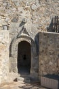 Stone door. Architectural detail of the Castle of Santiago, in Sanlucar de Barramda, Spain