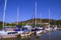Yachts and sailboats docked on the Guadiana River, on the border section between Spain and Portugal. Royalty Free Stock Photo