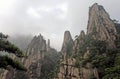 Sanqingshan Mountain in Jiangxi Province, China. Misty mountain scenery with rocky peaks on Mount Sanqing Royalty Free Stock Photo