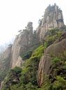 Sanqingshan Mountain in Jiangxi Province, China. Misty mountain scenery with rocky peaks on Mount Sanqing Royalty Free Stock Photo
