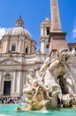 Sant`Agnese in Agone church and Fountain of Four Rivers Fontana dei Quattro Fiumi on Piazza Navona square, Rome, Italy Royalty Free Stock Photo