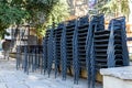 Sant Cugat del Valles- Catalonia, SPAIN - 10/23/2020: pile of cafeteria chairs and tables