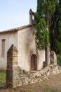 Sant Miquel del Castell chapel with cypress trees