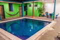 SANTA ANA, EL SALVADOR - APRIL 4, 2016: Small swimming pool in Casa Verde hostel in Santa Ana cit