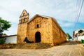 Santa Barbara church and stone cross in the colonial town of Barichara, Colombia Royalty Free Stock Photo