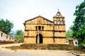 Santa Barbara church and stone cross in the colonial town of Barichara, Colombia Royalty Free Stock Photo