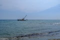 Santa Barbara, Limassol, Cyprus: June 13, 2018: Seascape showing plant machinery moving rocks to form a sea defence Royalty Free Stock Photo