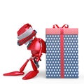 Santa bot leaning on the gift box in white background Royalty Free Stock Photo