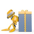 Santa bot leaning on the gift box in white background Royalty Free Stock Photo