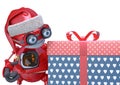 Santa bot beside and looking the gift box in white background Royalty Free Stock Photo