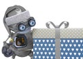 Santa bot beside and looking the gift box in white background Royalty Free Stock Photo