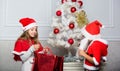 Santa bring christmas gift. Unpacking christmas presents. Reason children love christmas. Kids celebrate christmas with Royalty Free Stock Photo