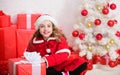 Santa bring her gift. Winter shopping sales. Christmas spirit is here. Winter holiday tradition. Kid happy with