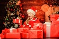 Santa brought me gifts. Child happy excited girl find gifts near christmas tree. Happiness and joy. Merry christmas Royalty Free Stock Photo